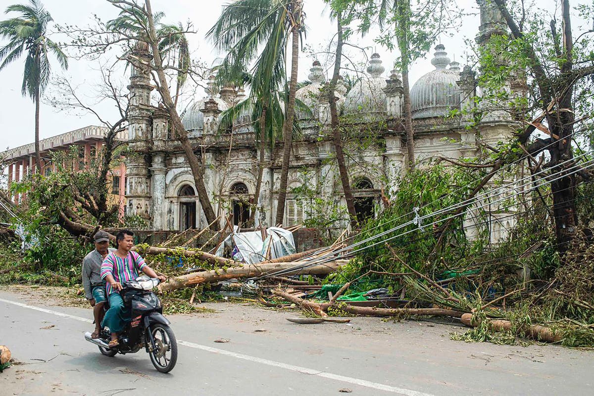 UN agency says Myanmar has suspended international aid deliveries to cyclone-hit areas