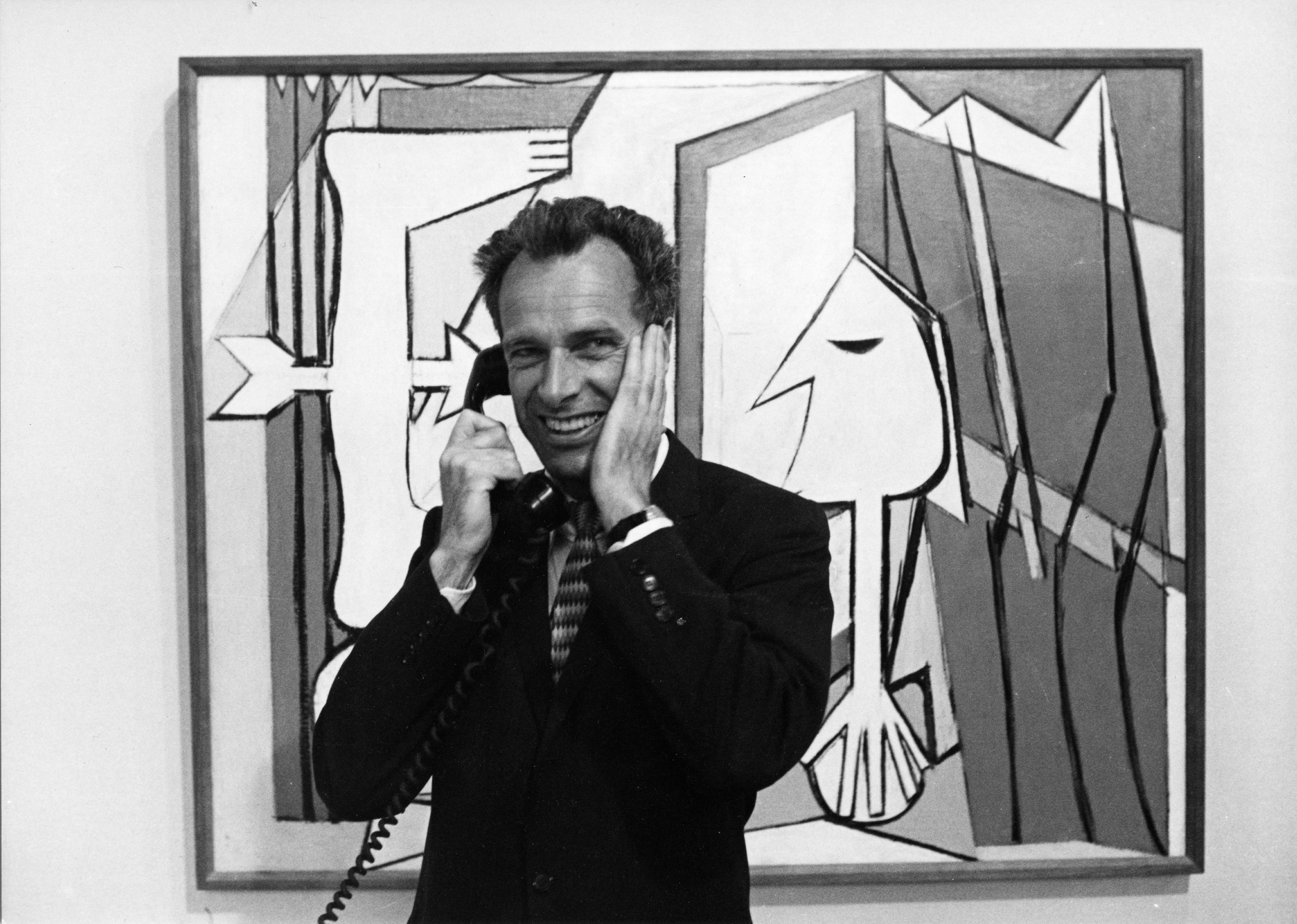 Ernst Beyeler in front of a work by Pablo Picasso at Art Basel in 1970