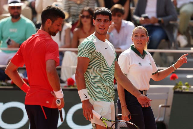<p>Carlos Alcaraz pulled up with cramp at the start of the third set at Roland Garros </p>