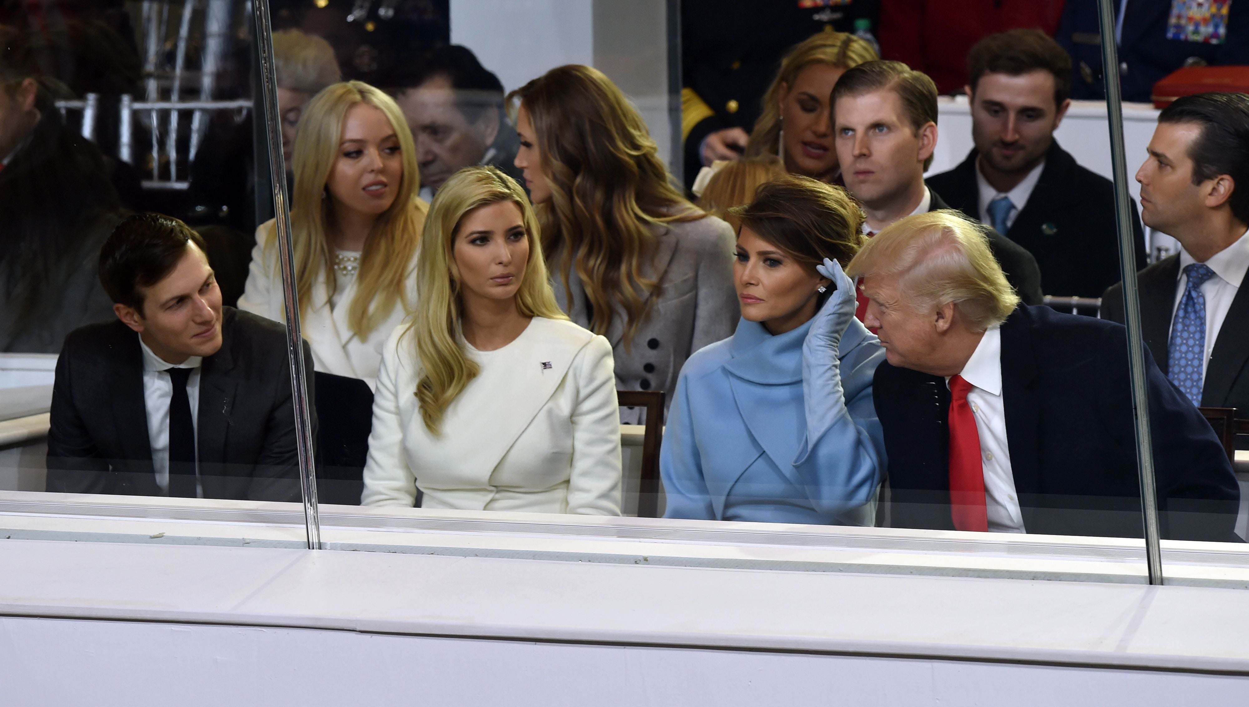 US President Donald Trump is joined by US First Lady Melania Trump (2nd R front), his daughter Ivanka Trump (2nd L front) and her husband Jared Kushner (L front) during the presidential inaugural parade on January 20, 2017 in Washington, DC