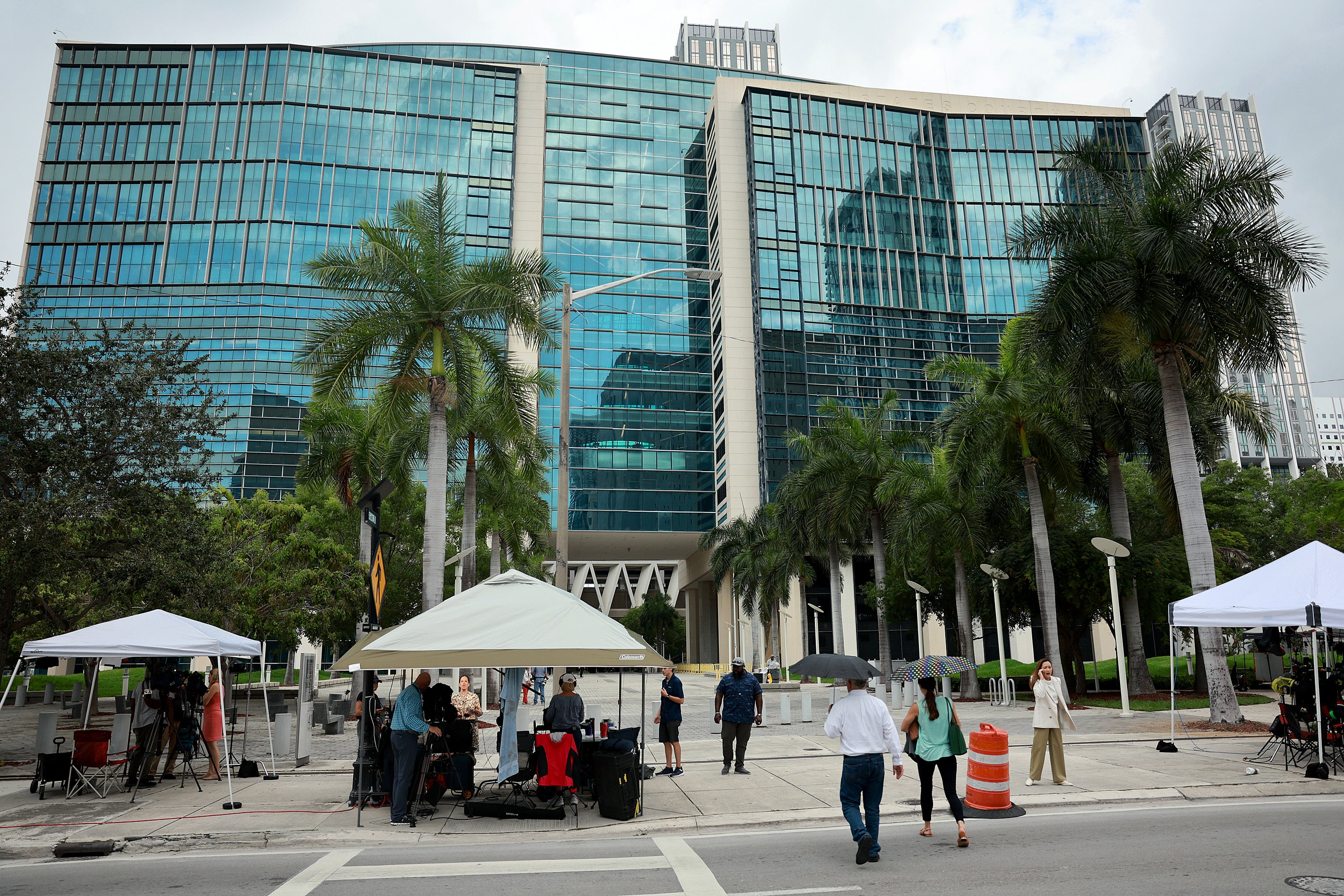 News crews camp out in front of a federal court building in Miami anticipating Donald Trump’s arrival after a federal indictment was unsealed on 9 June