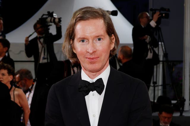 <p>Director Wes Anderson departs the "Asteroid City" red carpet during the 76th annual Cannes film festival at Palais des Festivals on May 23, 2023 </p>