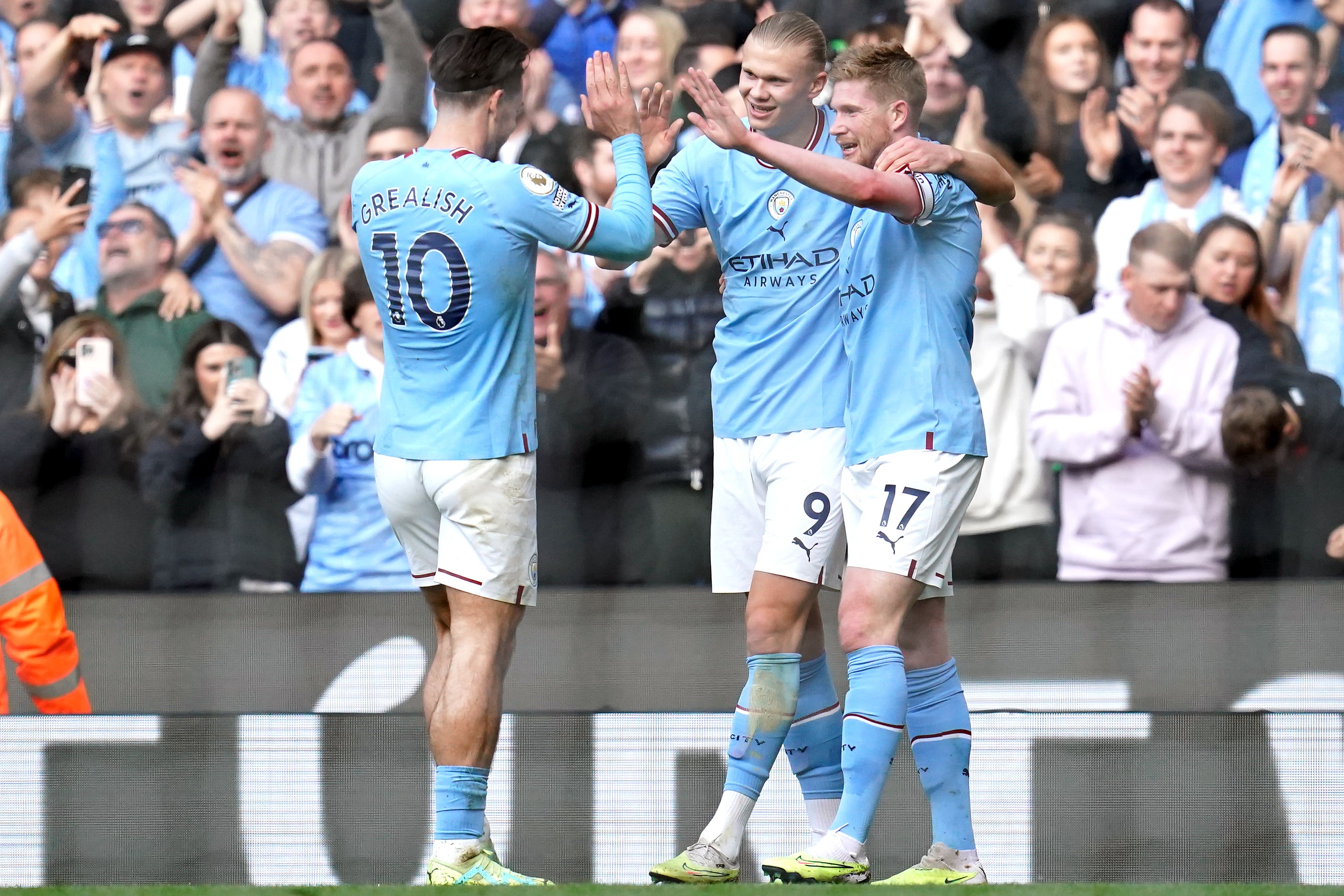 Erling Haaland, centre, Kevin De Bruyne, right, and Jack Grealish have been key to Manchester City’s attacking firepower (Nick Potts/PA)