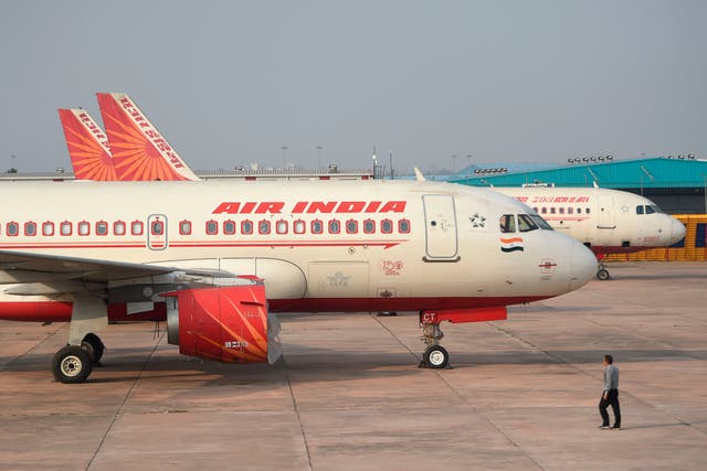 <p>An Air India plane is parked at Indira Gandhi International airport in New Delhi (file photo) </p>