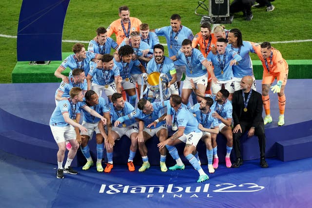 Manchester City’s Ilkay Gundogan lifts the Champions League trophy (Mike Egerton/PA)