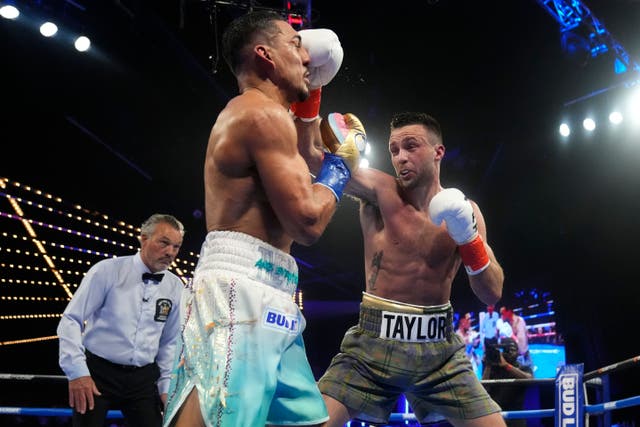 Josh Taylor, right, suffered his first defeat to Teofimo Lopez (Frank Franklin II/AP)
