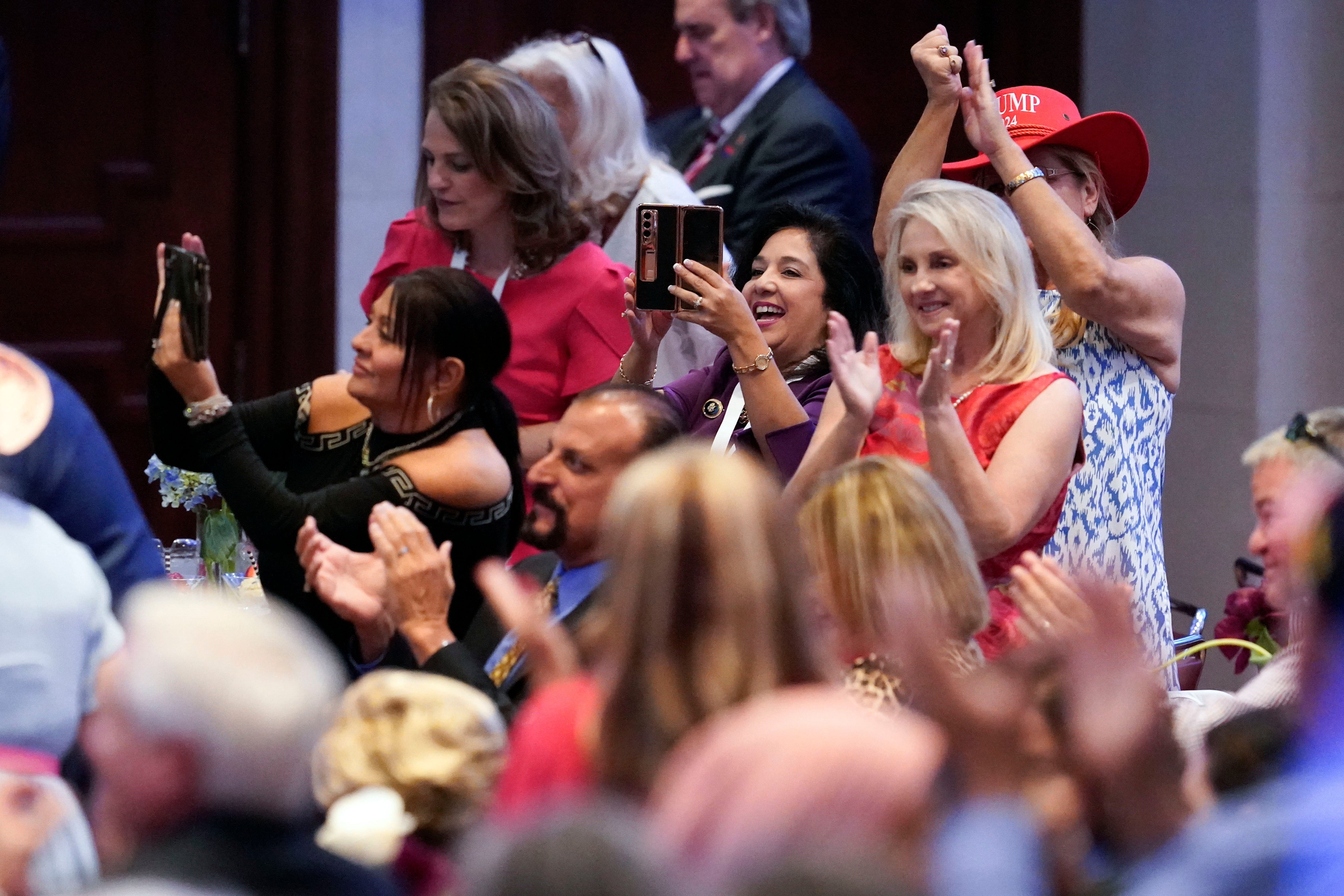 People cheer as former President Donald Trump speaks during the North Carolina Republican Party Convention in Greensboro, N.C., Saturday, June 10, 2023. (AP Photo/George Walker IV)