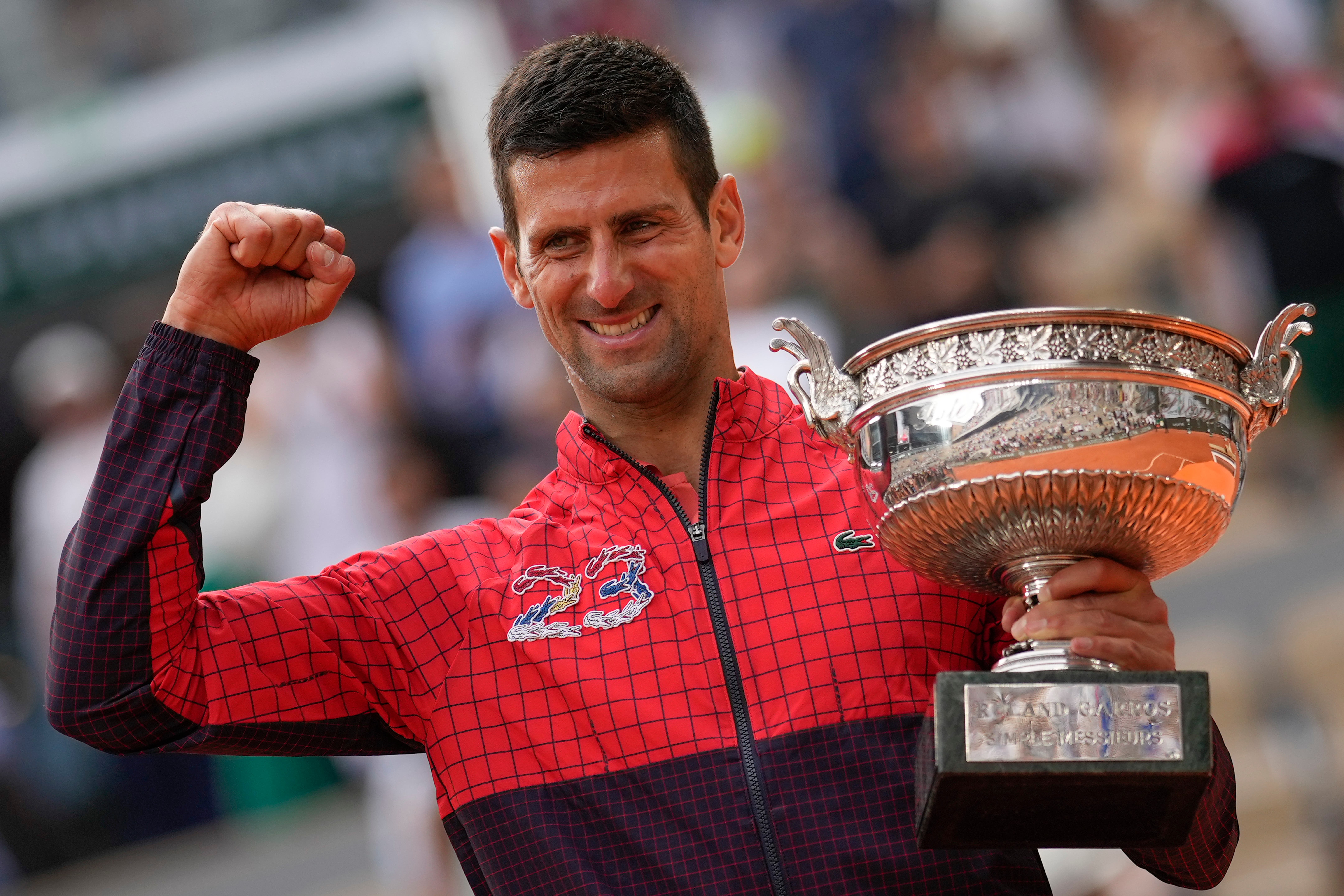 Novak Djokovic with the Coupe des Mousquetaires (Thibault Camus/AP)
