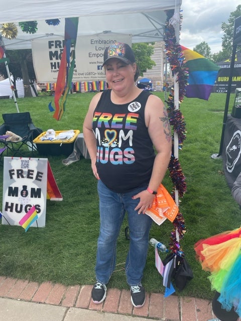 Virginia Dunn was offering free hugs at the end of the Pikes Peak Pride parade route on Sunday