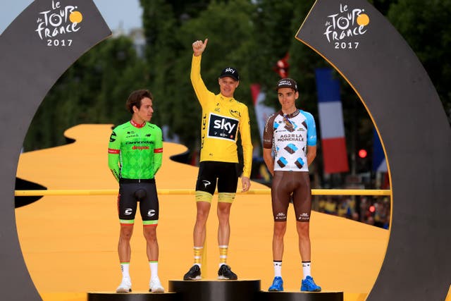 Chris Froome (centre) celebrates after winning the 2017 Tour de France (Adam Davy/PA)