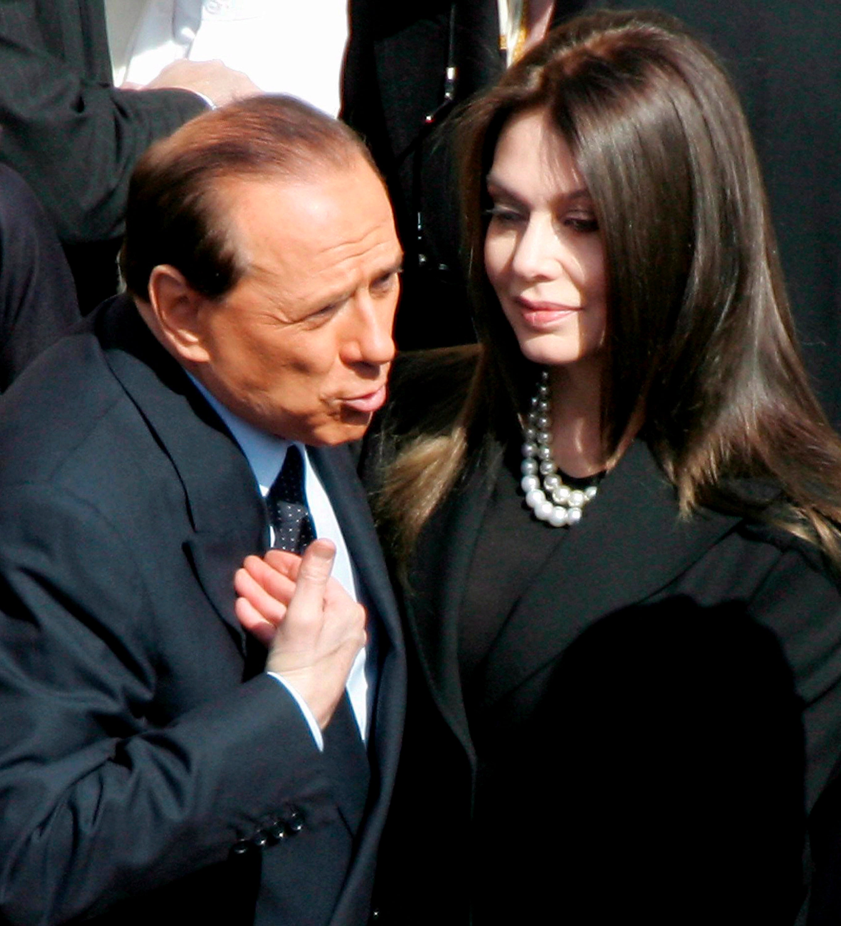 Berlusconi and his wife at the time, Veronica Lario, in 2005