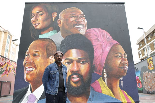 Street artist Neequaye Dreph has unveiled a new mural at Stockwell Hall of Fame for National Blood Week (Keanu Taylor/PA)