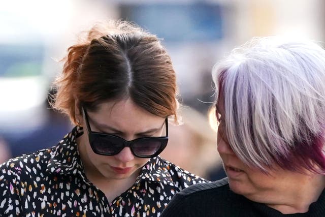 Paris Mayo (left) arrives at Worcester Crown Court where she is charged with the murder of Stanley Mayo on March 23, 2019 (Jacob King/PA)