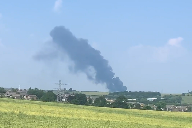 A large plume of smoke could be seen overhead Bramley, Leeds after a fire broke out at a plastics factory (AidenLeeds/PA)