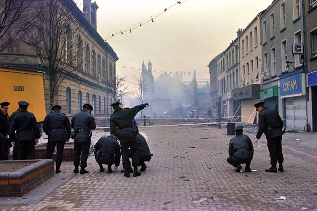 The RUC assist forensic officers in the aftermath of the bombing (PA)