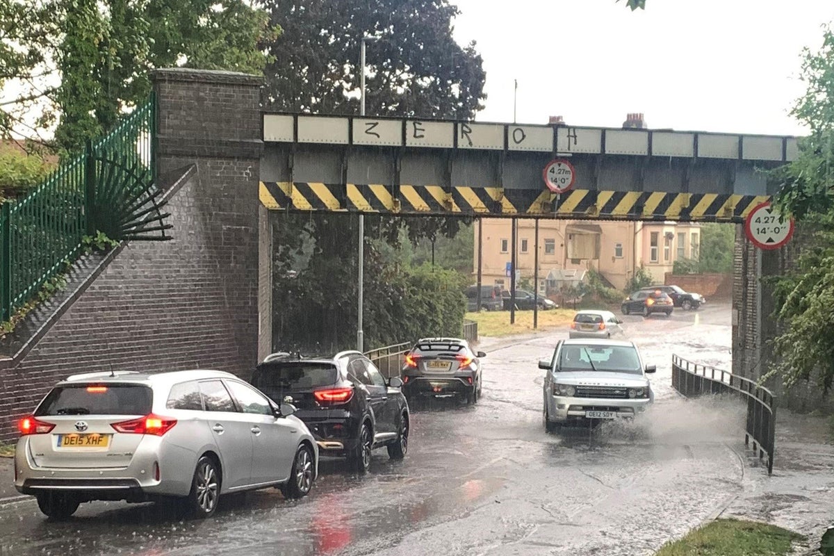 UK weather: Flood warnings issued after half a month’s rain falls in one hour