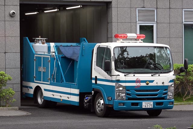 <p>A vehicle from the Nara Prefectural Police, believed to be carrying a suspicious object, is pictured on 12 June  2023</p>