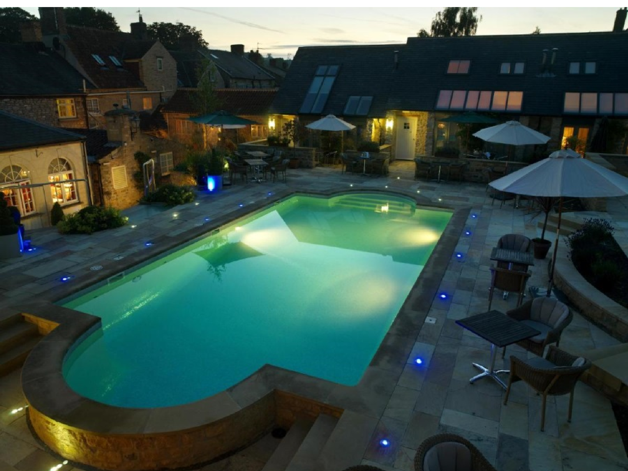 The outdoor pool at The Feversham arms is heated and there’s a hot tub nearby, too