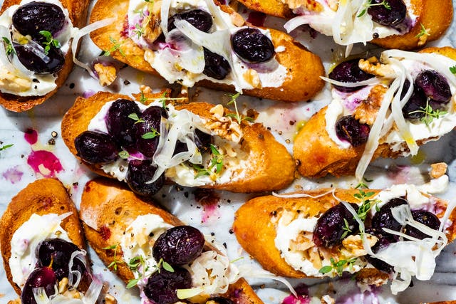 <p>Crispy slices of baguette topped with creamy feta and succulent grapes</p>