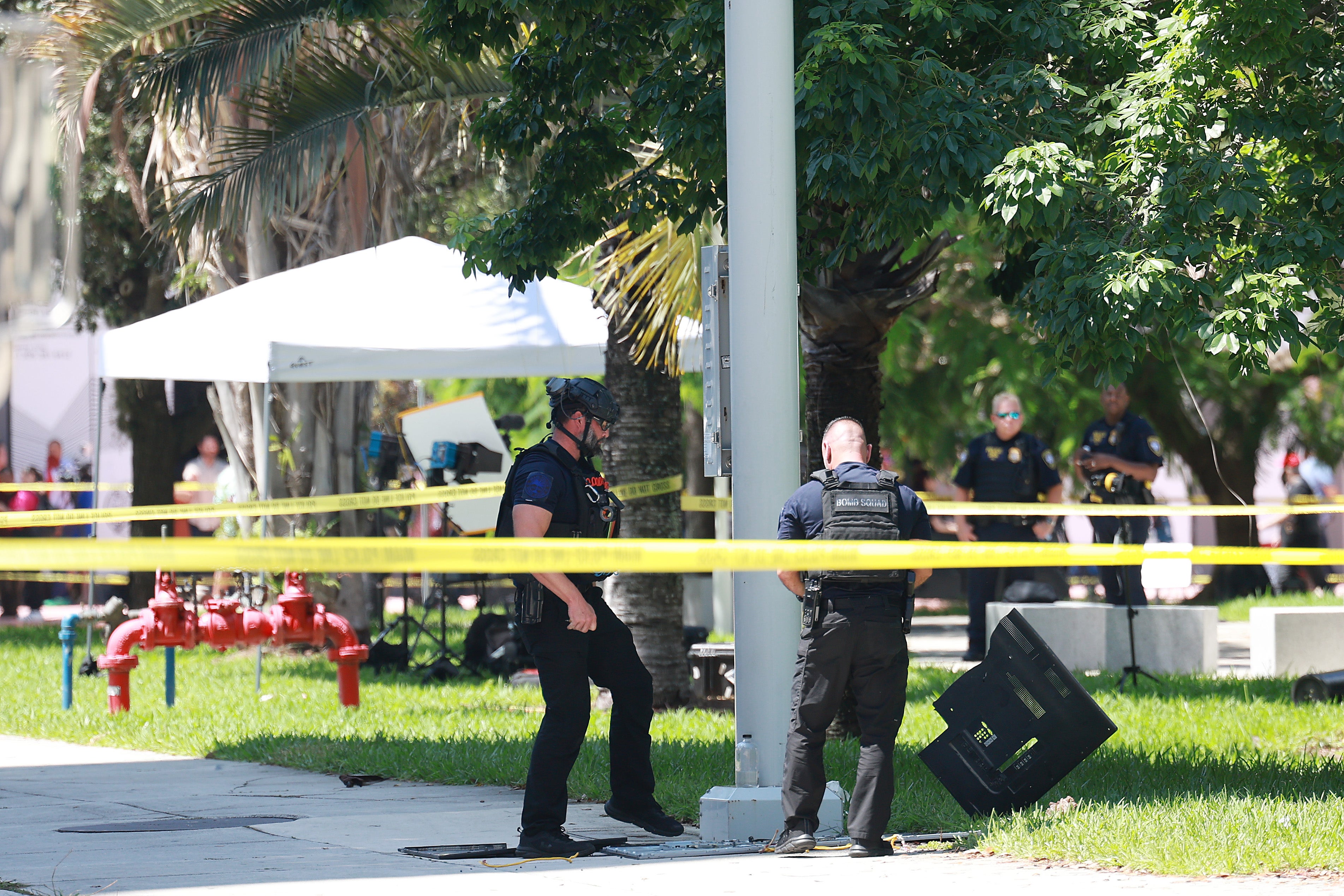 Miami Police investigate a suspicious item near the media area outside the Wilkie D. Ferguson Jr. United States Federal Courthouse where former President Donald Trump is scheduled to be arraigned later in the day on June 13, 2023 in Miami, Florida