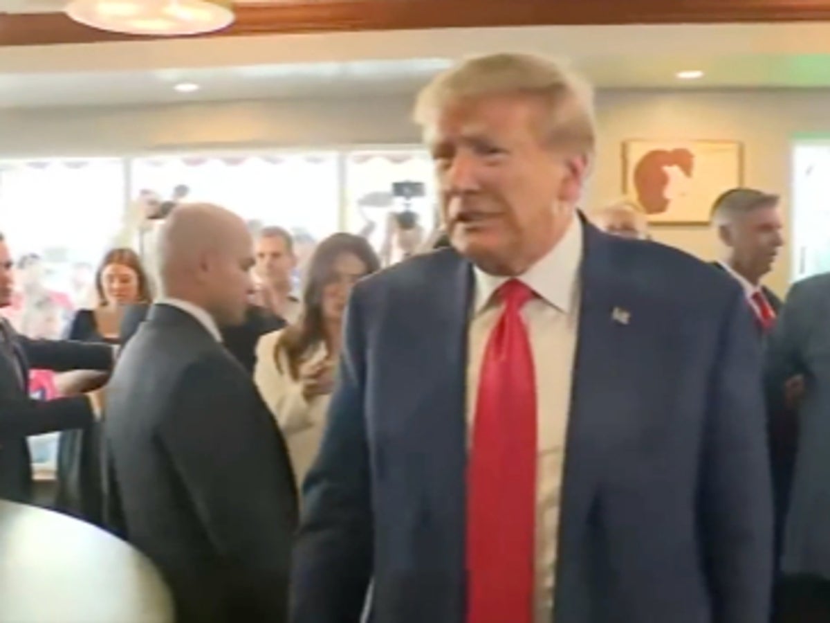 Trump stops at Versailles restaurant after his arrest where supporters pray over him and sing ‘Happy Birthday’