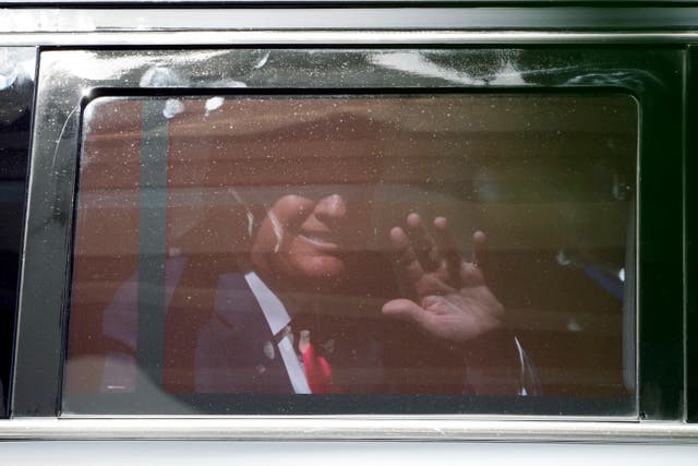 <p>Trump waves as he leaves the Miami courthouse  </p>