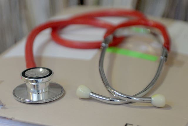 A new report questions whether fewer GP referrals to hospital could lead to a ‘hidden backlog’ (Anthony Devlin/PA)