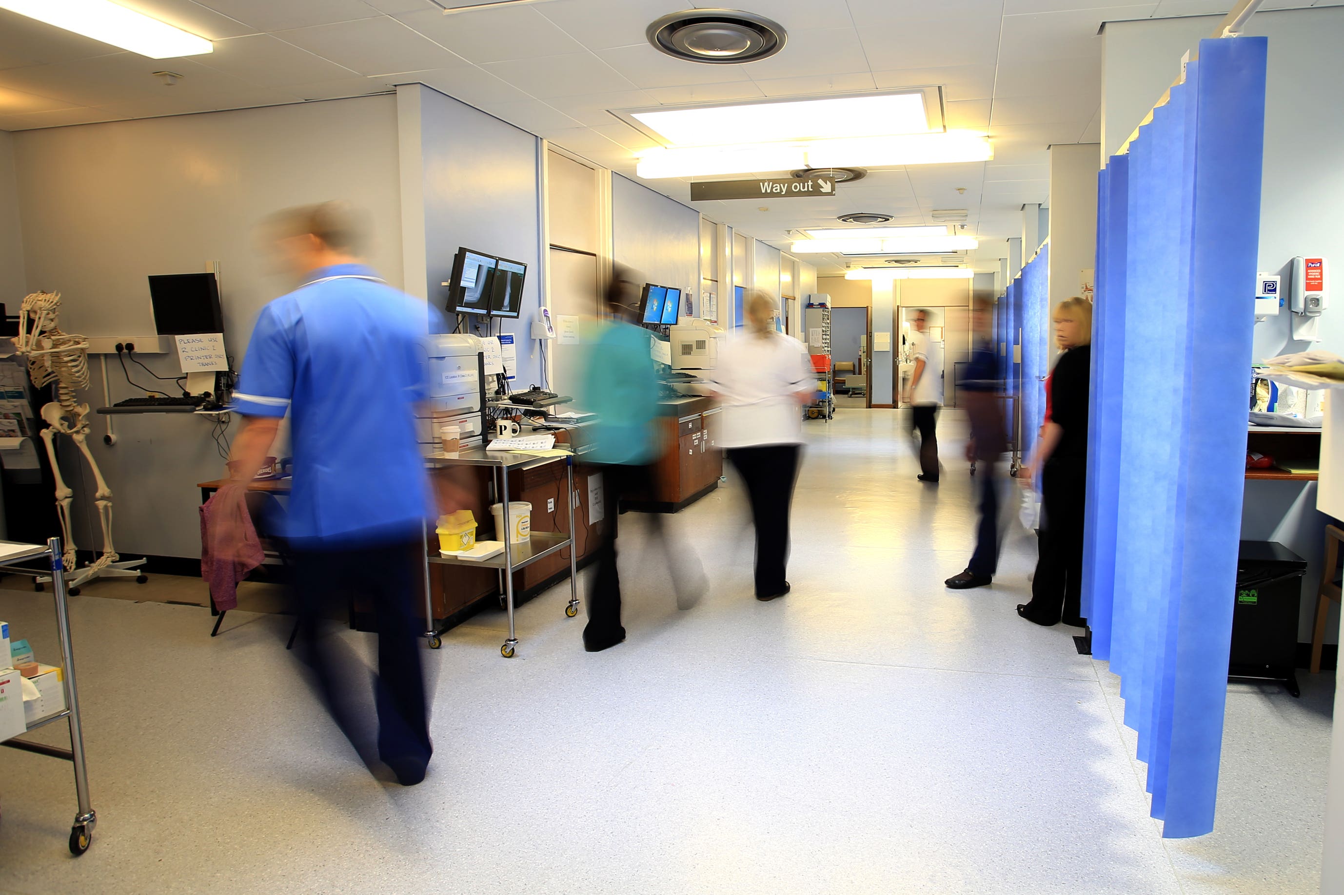 Recently retired consultants are being called upon to help clear NHS England’s hospital wait lists (Peter Byrne/PA)
