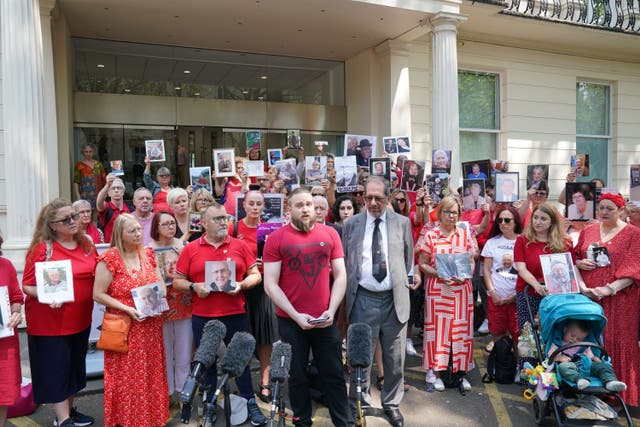 Matt Fowler (centre) co-founder of Covid Bereaved Families For Justice speaks to media outside the UK Covid-19 Inquiry at Dorland House in London (Lucy North/PA)