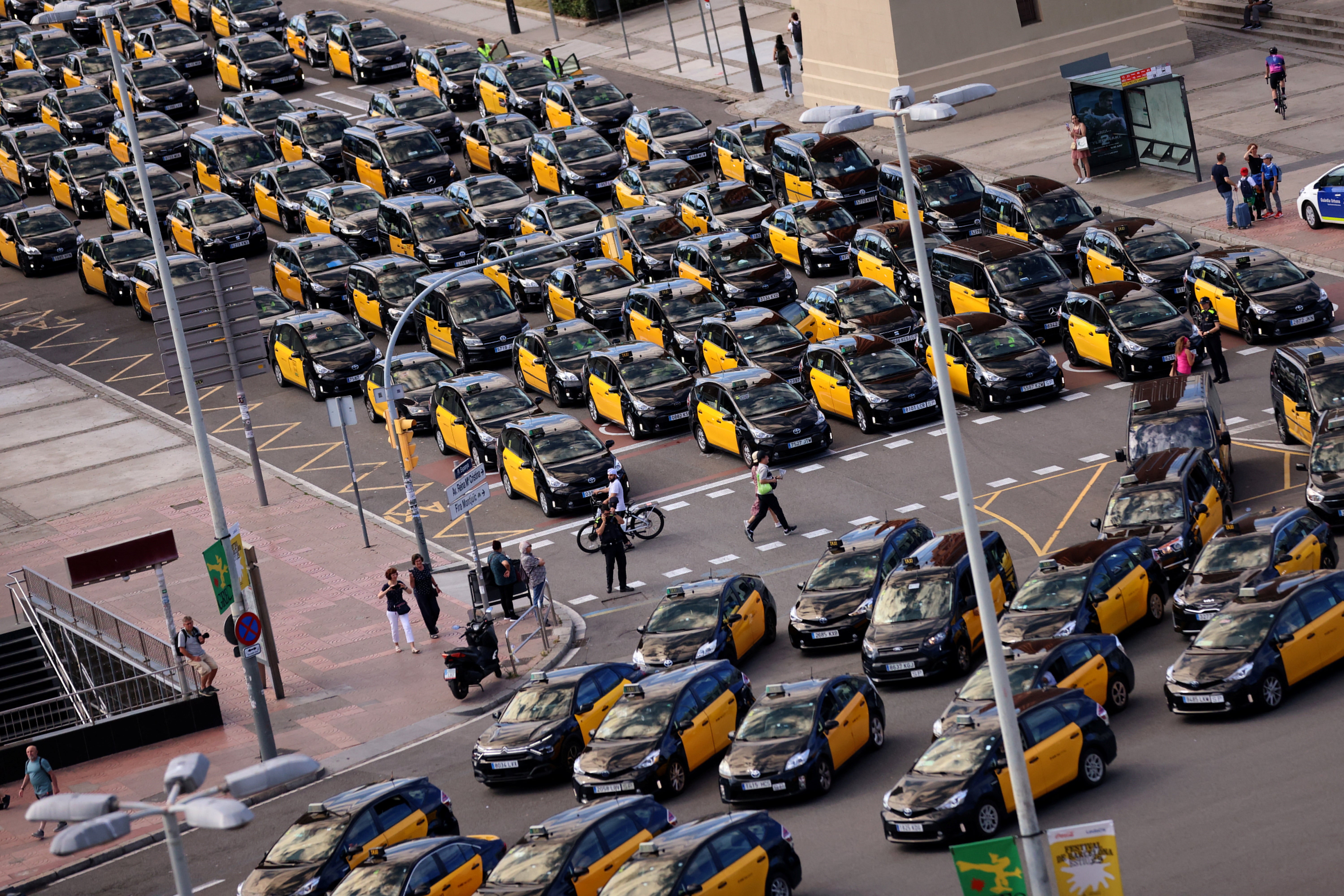 Taxi drivers protest, after the Court of Justice of the European Union rejected rules set by the city of Barcelona that dramatically restrict the number of cars working with ride-hailing apps, in Barcelona