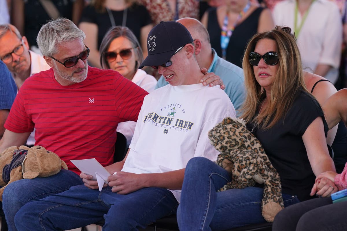 Nottingham attack &ndash; latest: Thousands attend vigil as families of victims embrace 