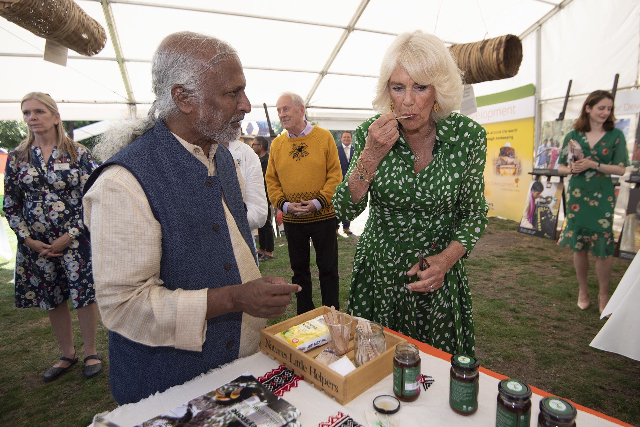 Camilla stamps 'Queen Bee' on paper art installation at beekeeping charity event - Vimarsana News