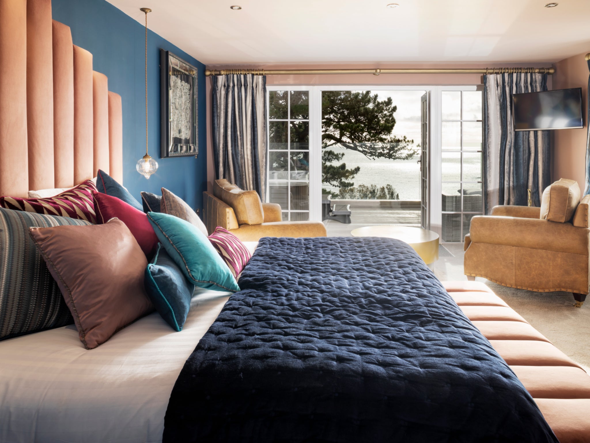 The whimsical Talland Bay has both traditional and modern rooms with stunning sea views