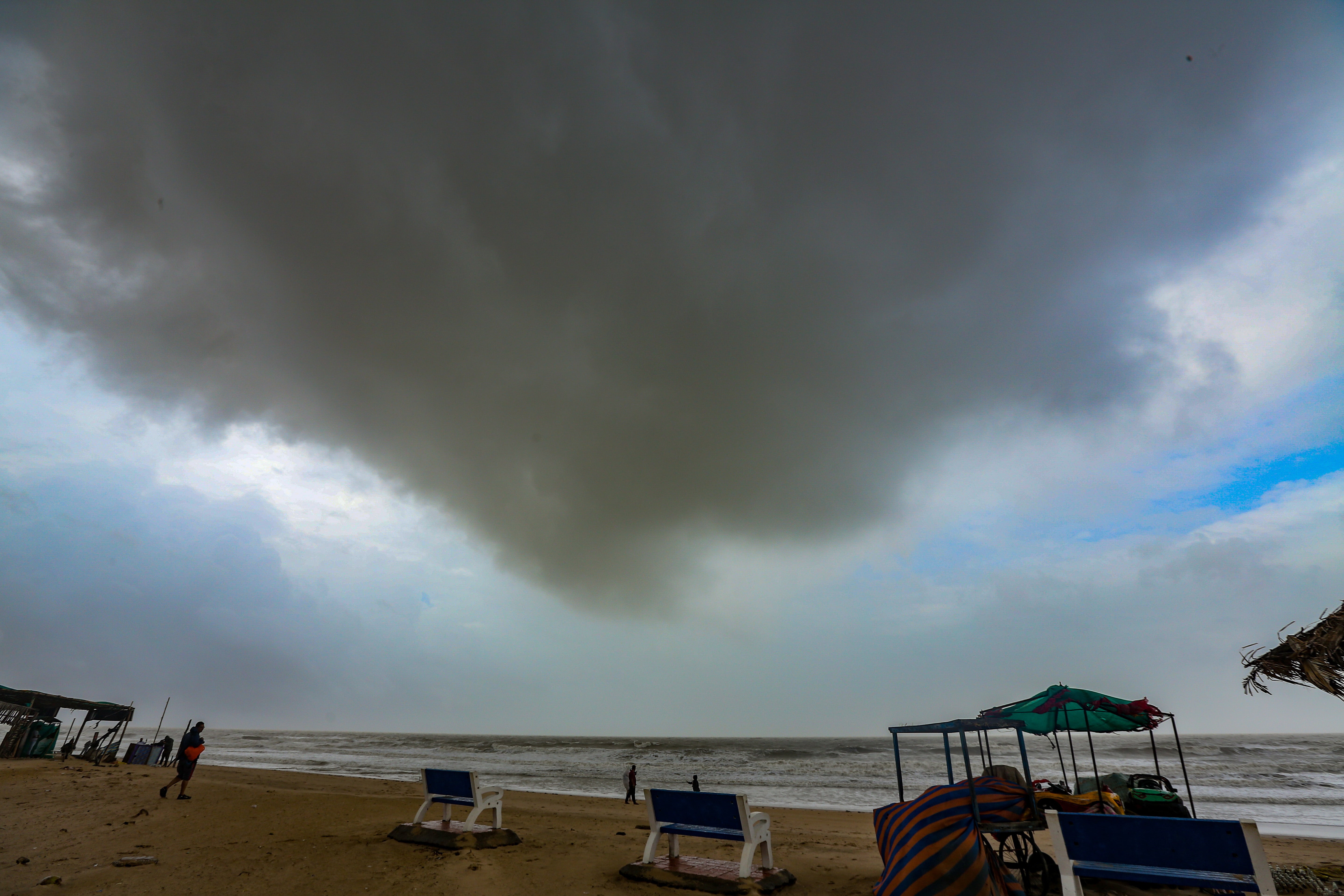 A cloud shapes above a deserted beach in Mandvi, in the Kutch district of the western state of Gujarat, India