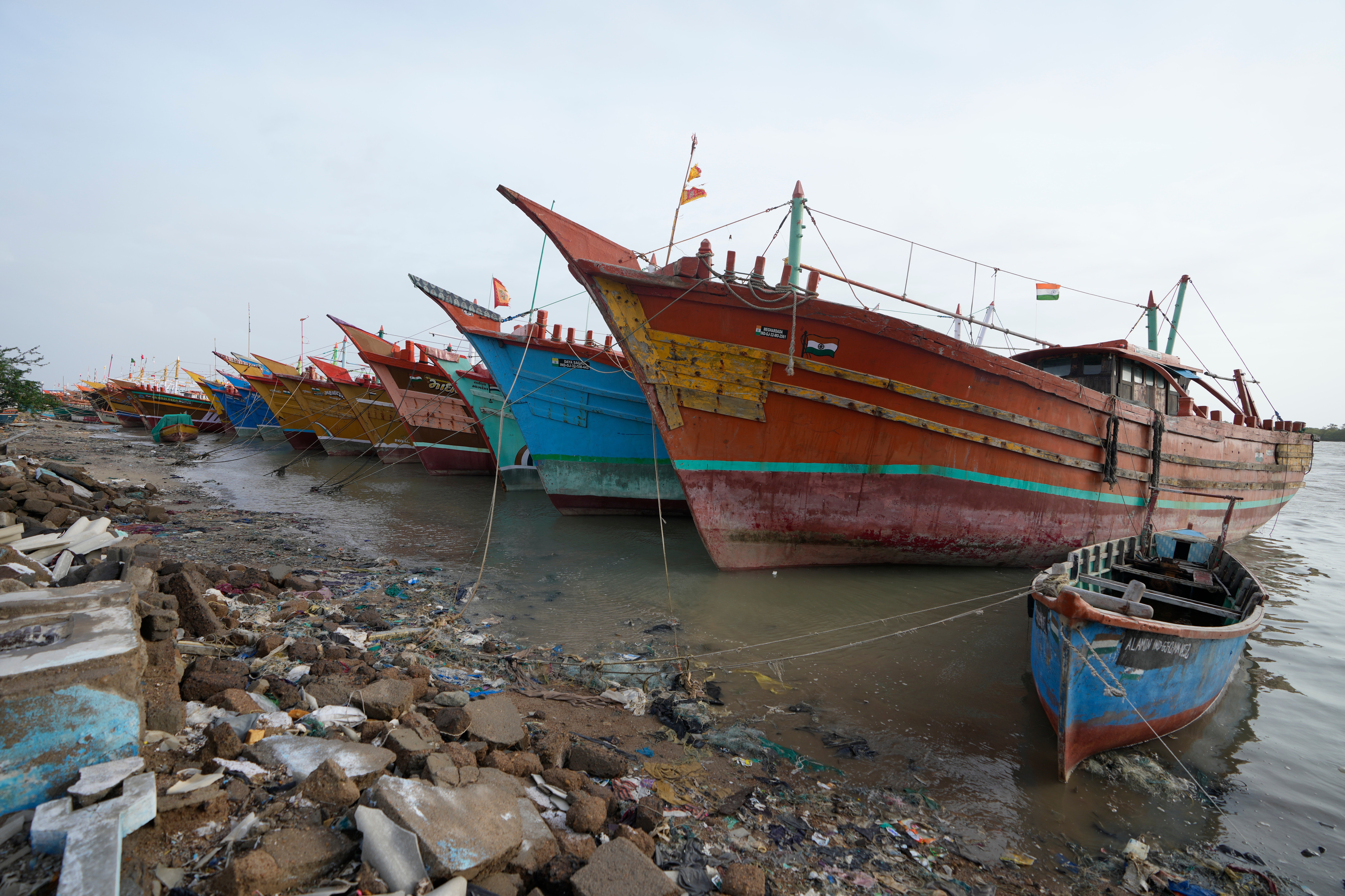 Boats stand anchored at Jakhau Port in Kutch district, India