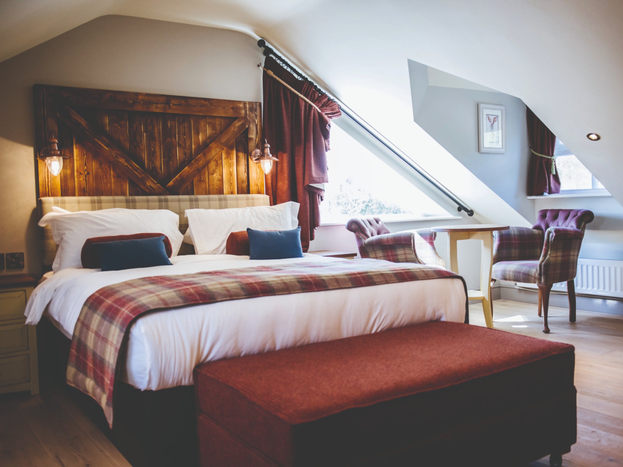 The Crown Inn’s traditionally furnished bedrooms overlook Pooley Bridge’s market place