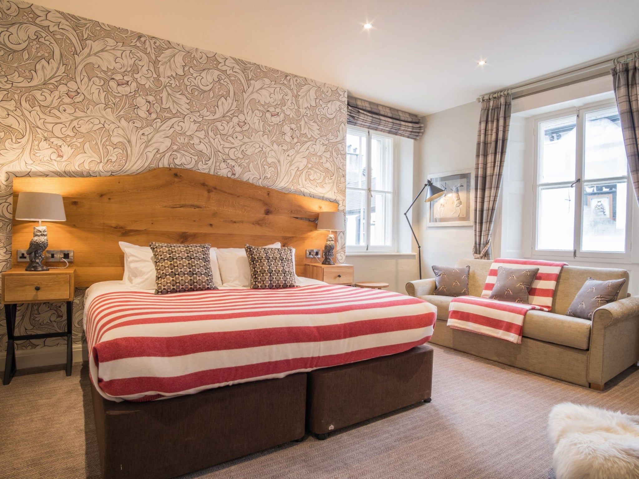 Luxury wallpaper and bespoke oak furniture make for a homely stay