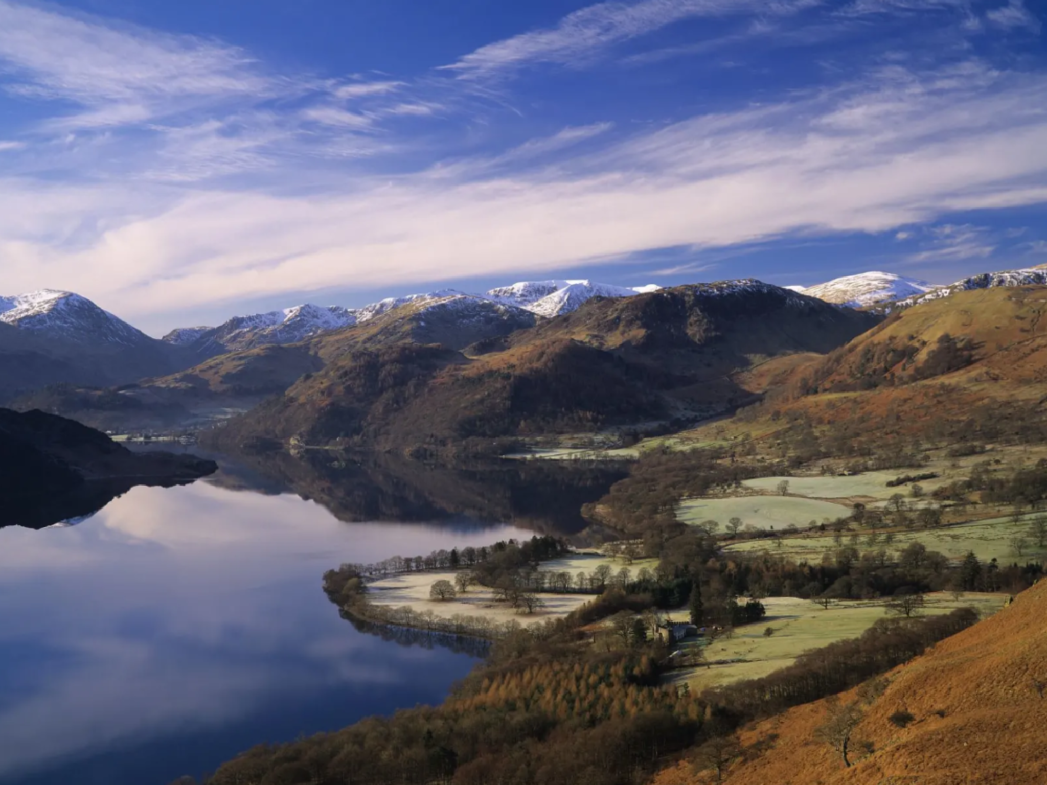 Panoramic lake views of Ullswater can be seen from glamping pods at The Quiet Site