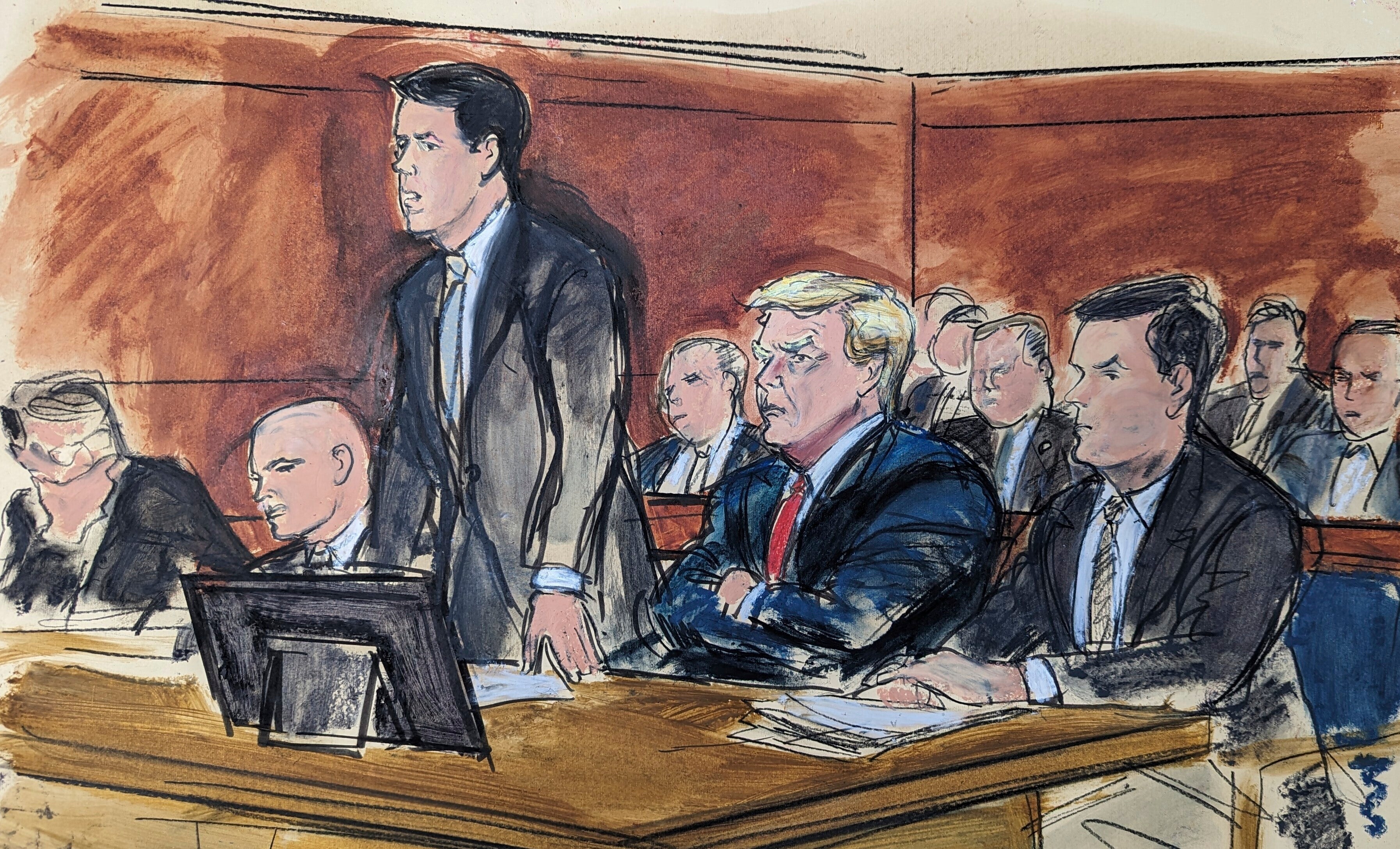 Attorney Todd Blanche enters a plea of not guilty on behalf of Donald Trump, second from right, in federal court