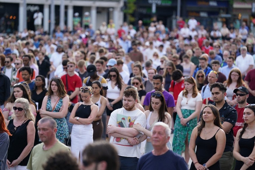Thousands gathered at the Market Square to pay tribute to the three victims