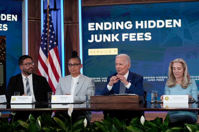 <p>President Joe Biden speaks in the South Court Auditorium on the White House complex in Washington, Thursday, June 15, 2023, to highlight his administration's push to end so-called junk fees that surprise customers. Phil Hutcheon, CEO of DICE, left, Tobi Parks, CEO of xBk, second form left, and Lael Brainard, Assistant to the President and Director of the National Economic Council, right, listen. (AP Photo/Susan Walsh)</p>