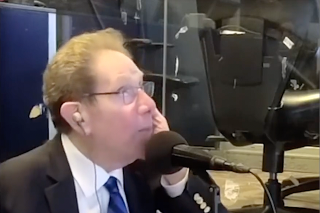 <p>New York Yankees radio broadcaster John Sterling, shortly before being hit by a foul ball</p>