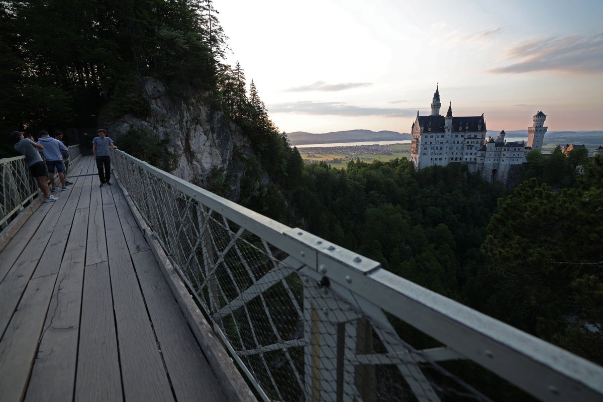 American woman dead after man ‘throws two tourists off bridge’ at German fairytale castle