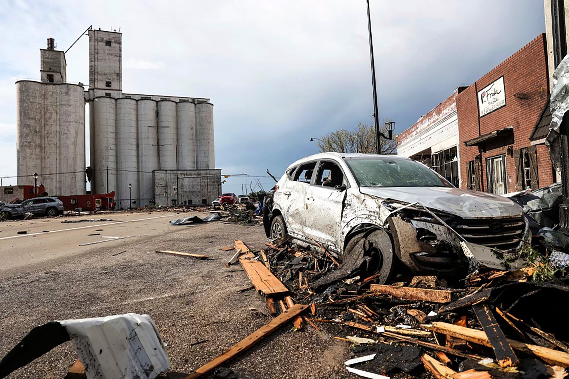 A vehicle and buildings are damaged in Perryton