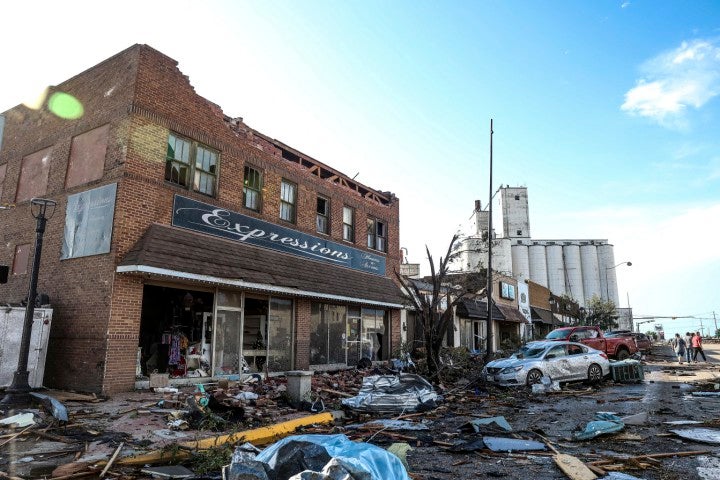 Buildings and vehicles show damage after a tornado struck Perryton