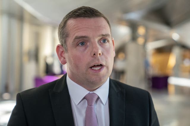Scottish Conservative leader Douglas Ross has been urged by the SNP to order his party’s MPs to vote for the sanctions on Boris Johnson (PA)