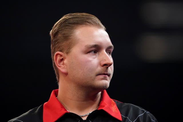 Dimitri Van den Bergh is paired with Kim Huybrechts at the World Cup of Darts, but they do not get along (Zac Goodwin/PA)