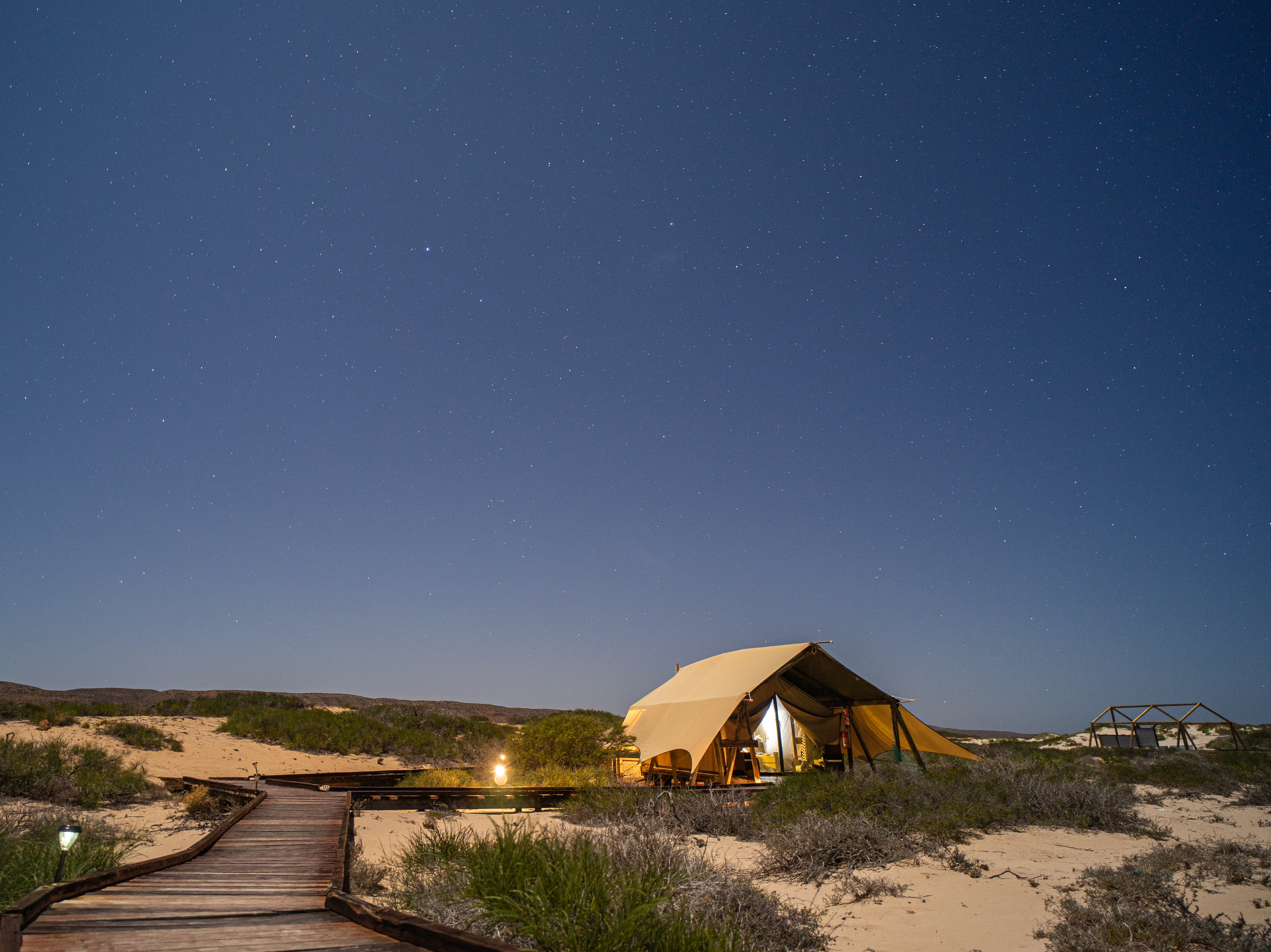 Have that blow-out holiday with Sal Salis Ningaloo Reef’s foot-in-sand luxury