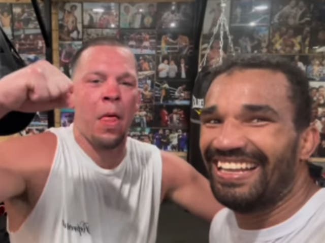 <p>Esquiva Falcao (right) after a training session with Nate Diaz</p>