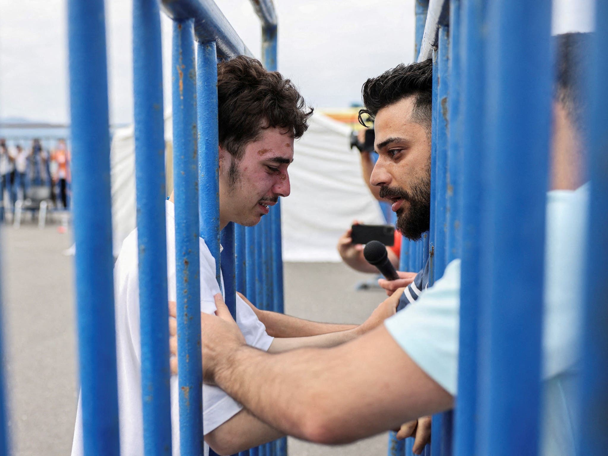 Emotional reunions for Greek boat disaster survivors – as coastguard denies reports tow led to tragedy - Vimarsana News
